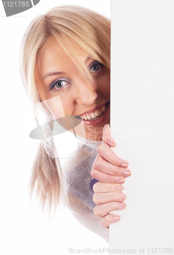 Image of Woman beside whiteboard