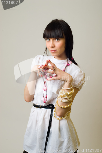 Image of Woman with beads