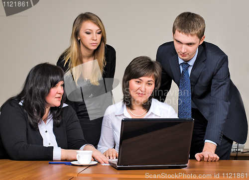 Image of Businessgroup with laptop