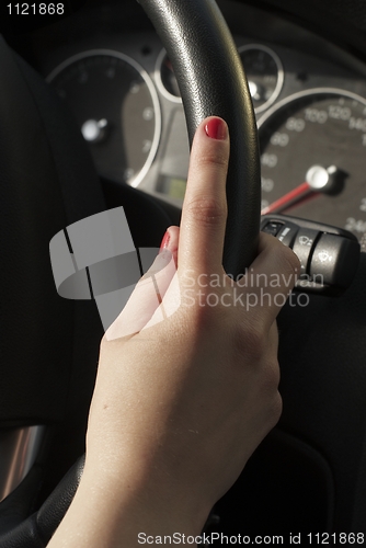 Image of Young woman in car