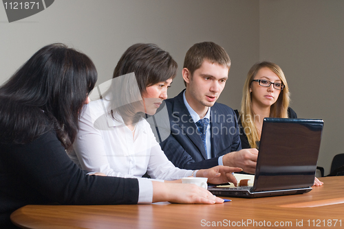 Image of Businessgroup with laptop