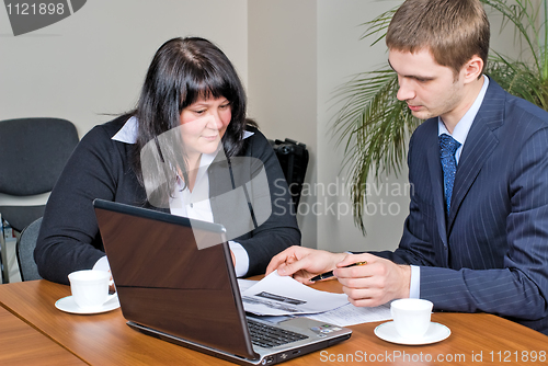Image of Businessmen with laptop
