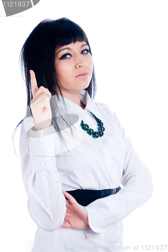 Image of Attractive young woman with her finger up