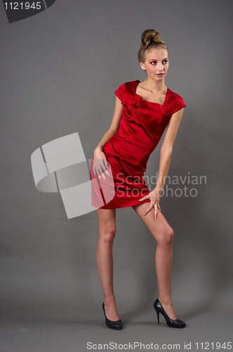 Image of Sexy slim woman in red dress