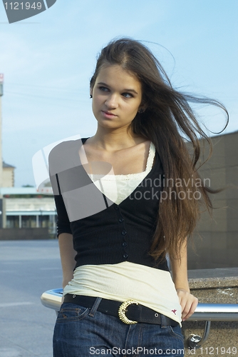 Image of Young waiting woman