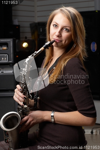 Image of Woman with saxophone