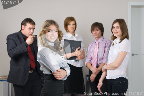 Image of Businesswoman with her team