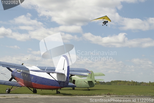 Image of Paraglider over planes