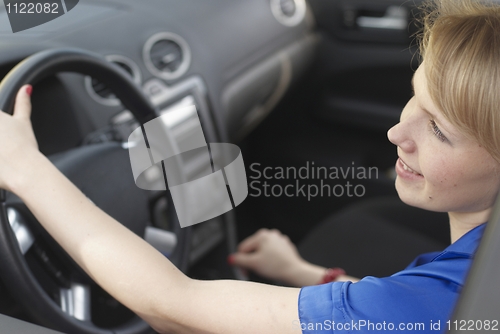 Image of Smiling young woman-driver