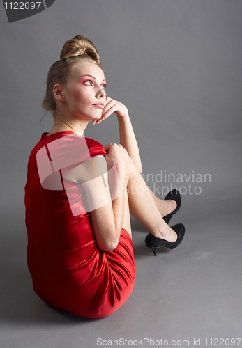 Image of Sexy slim woman in red dress