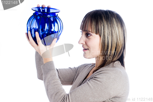 Image of Young woman with vase