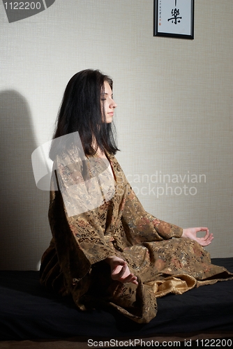 Image of Meditative girl