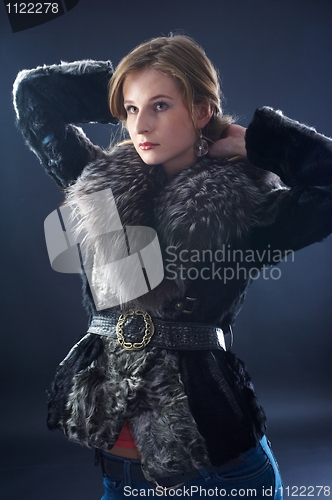 Image of Attractive woman in fur coat