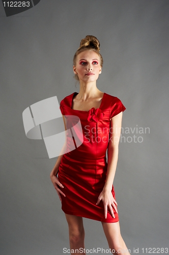 Image of Sexy slim woman in red dress