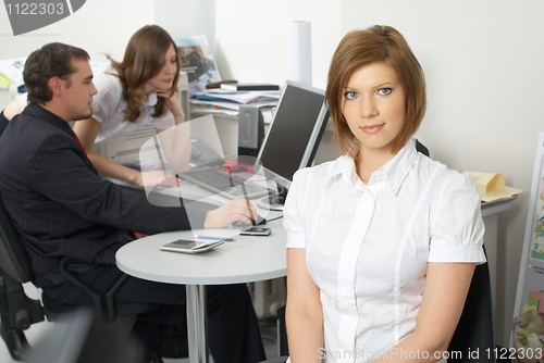 Image of Businesswoman with her team