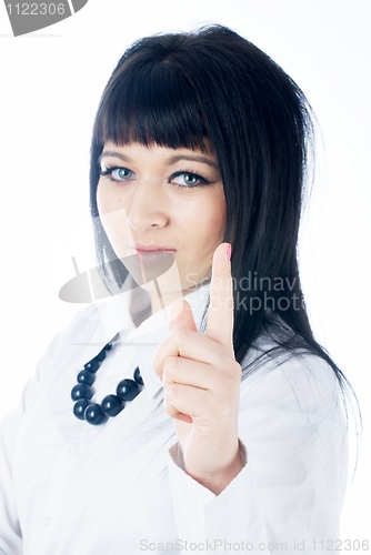 Image of Attractive young woman with her finger up
