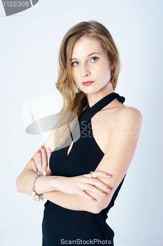 Image of Beautiful woman in black dress