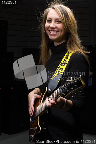 Image of Woman with guitar