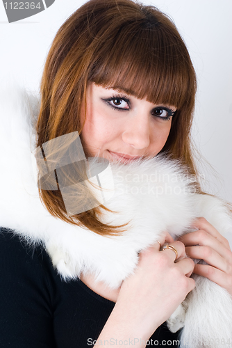 Image of Girl wearing white fur