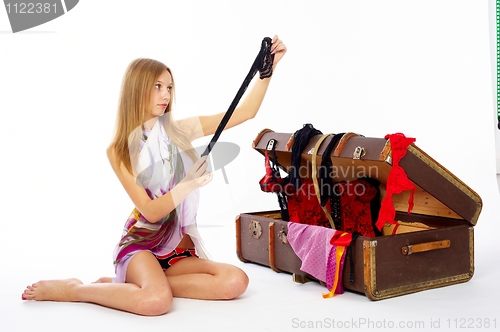 Image of Pretty woman with suitcase