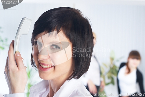 Image of Calling woman