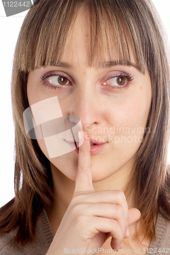 Image of Woman gesturing to silence