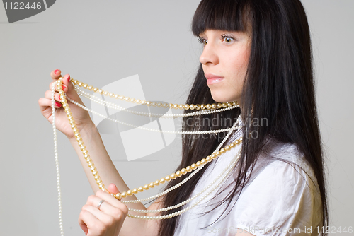 Image of Woman with beads