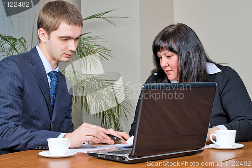 Image of Businessmen with laptop