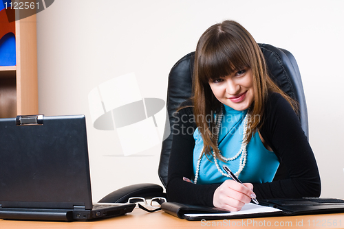 Image of Business woman with laptop