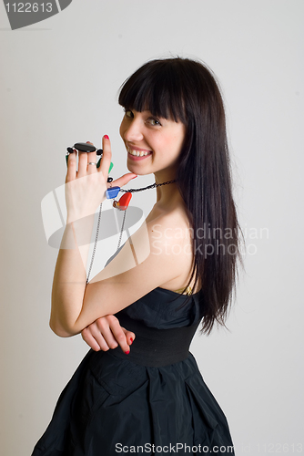 Image of Girl with beads