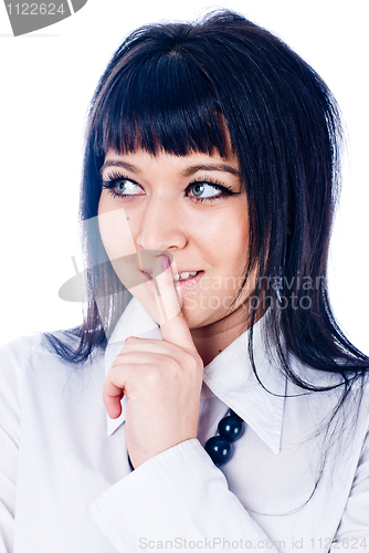 Image of Woman gesturing to silence