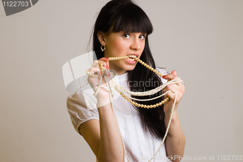 Image of Woman with beads