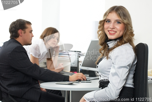 Image of Businesswoman with team