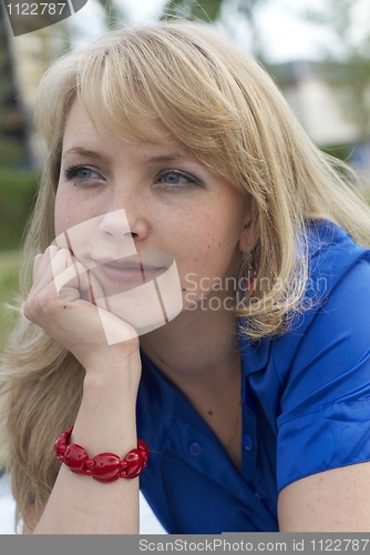 Image of Woman lying on grass