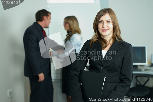 Image of Businesswoman with her team