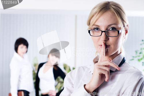 Image of Woman with sign "keep silence"