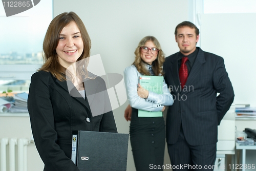 Image of Businesswoman with team