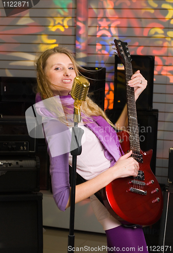 Image of Woman with guitar