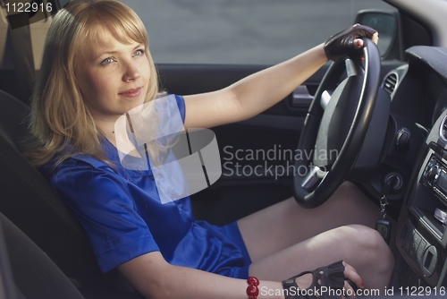 Image of Girl driving a car