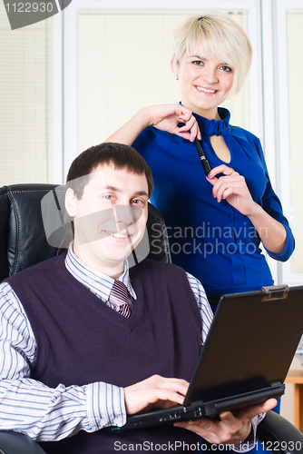 Image of Business team with laptop