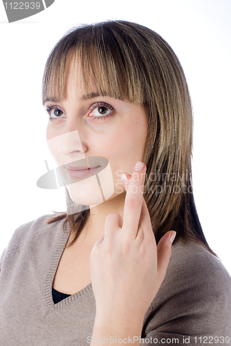 Image of Girl with crossed fingers