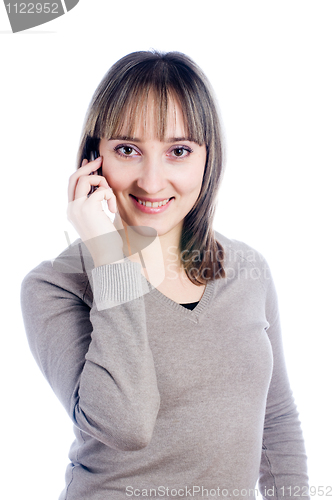 Image of Woman talking by mobile