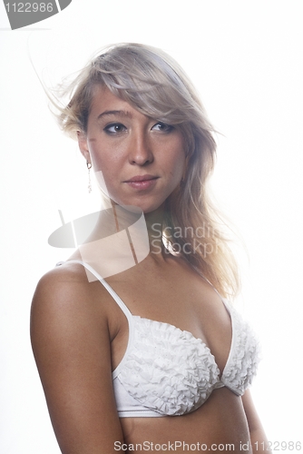 Image of woman in white bra