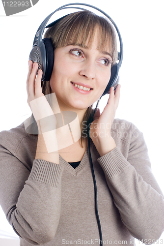 Image of Woman listening music