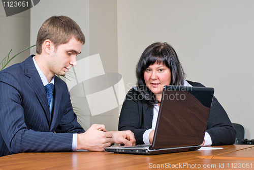 Image of Businessmen with laptop