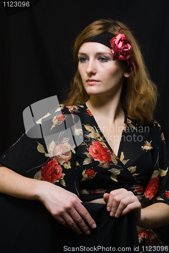 Image of Portrait of girl at black
