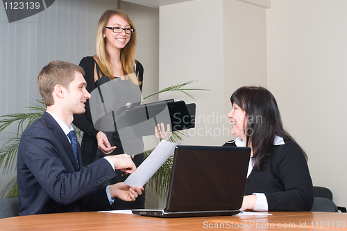 Image of Businessgroup with laptop
