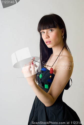 Image of Girl with beads