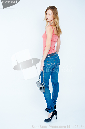 Image of Beautiful woman with bag