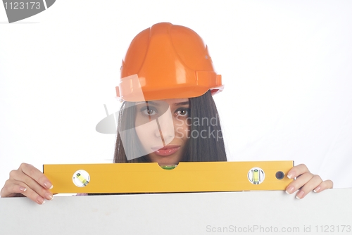 Image of Woman in helmet wyh level